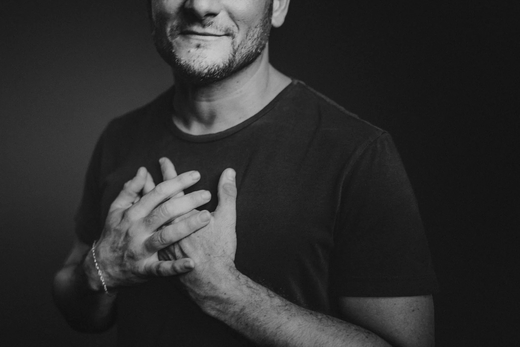 Joe Che, hands over his heart